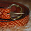 ceinture tan et boucle bronze